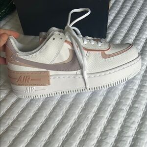 White and Pink Nike Air Sneakers